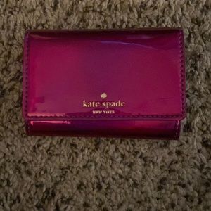 Purple Kate Spade keychain wallet